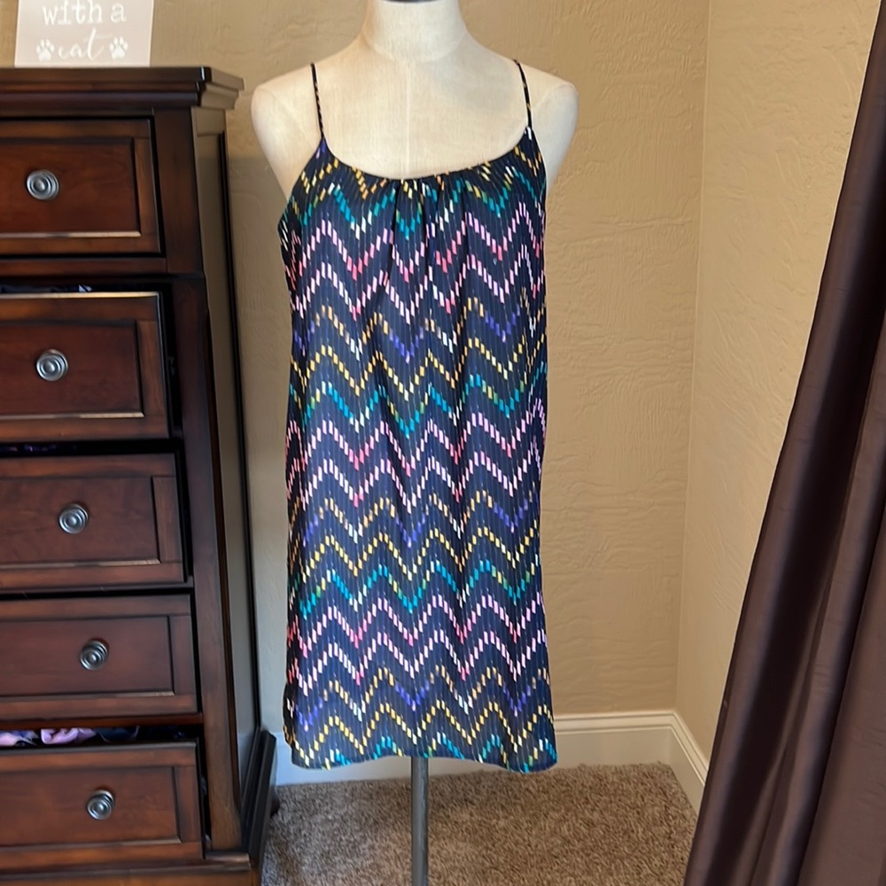 Very cute open back spaghetti strap dress. Like new never worn. Size small